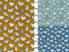 Two fabric swatches with chicken pattern, one on brown and one on blue.