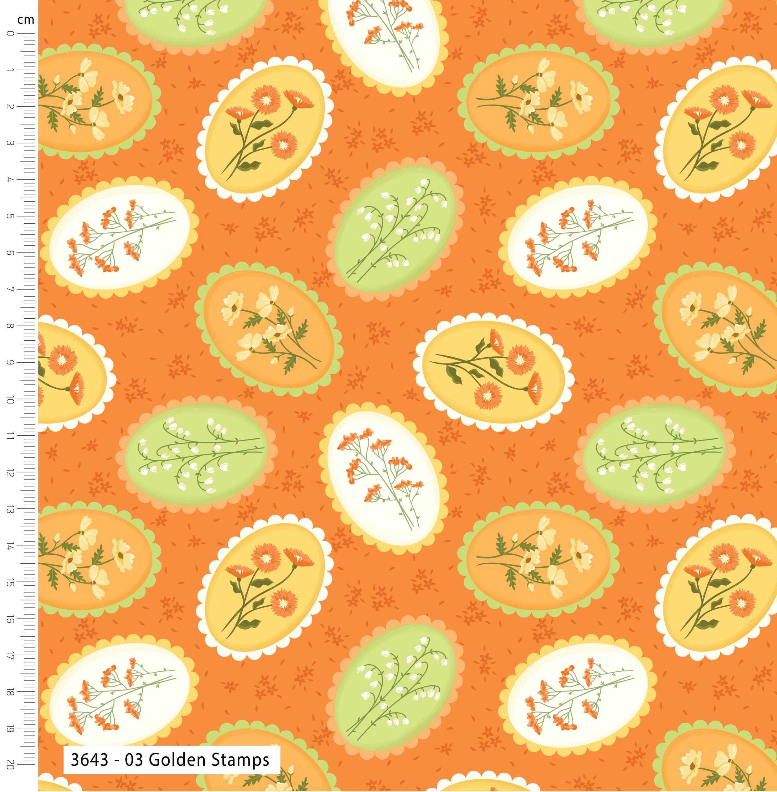 Patterned fabric with floral designs on an orange background, featuring a ruler for scale.