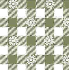 Checkered pattern with green and white squares and white flowers on a checkered background