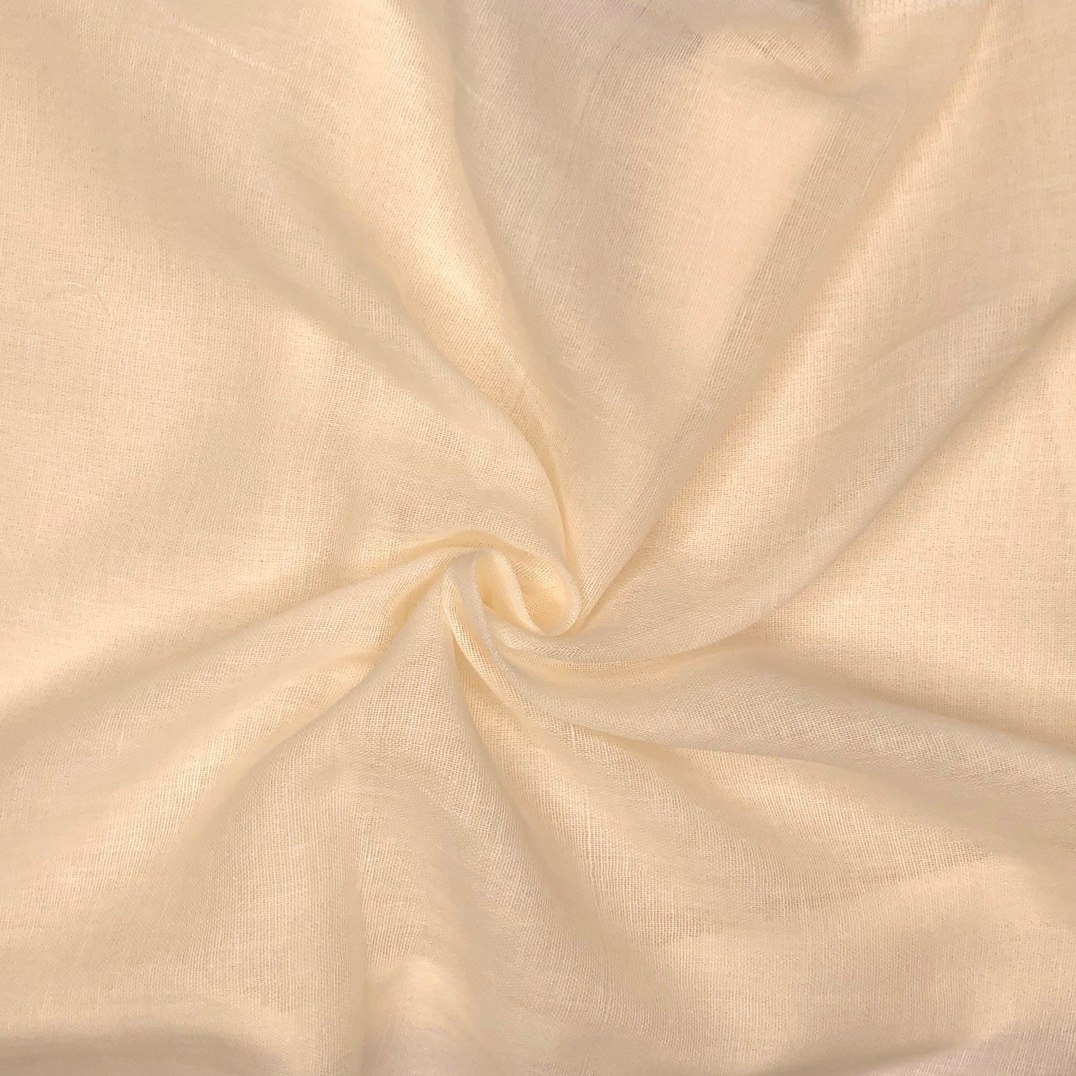Beige fabric with a subtle texture and swirl pattern

