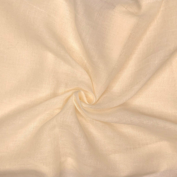 Beige fabric with a subtle texture and swirl pattern

