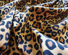 Cotton Poplin fabric in Leopard Print Beige Color