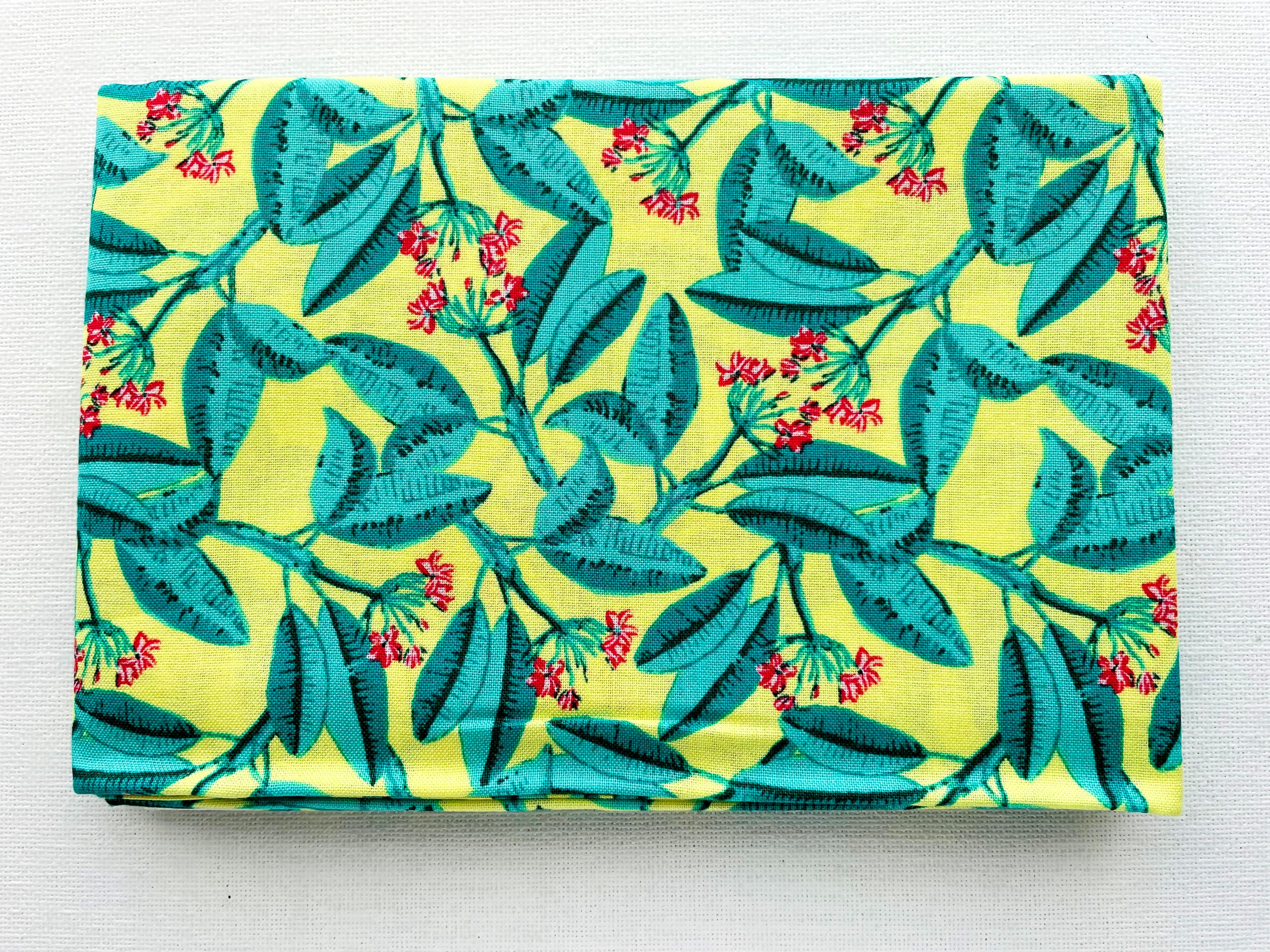 Tropical Leaves Cotton Fat Quarters Fabric on a Yellow Background