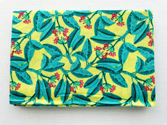 Tropical Leaves Cotton Fat Quarters Fabric on a Yellow Background